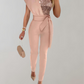 EOS | Luxuriöser Jumpsuit mit Schleifengürtel und Glitzerdetail
