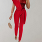EOS | Luxuriöser Jumpsuit mit Schleifengürtel und Glitzerdetail