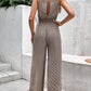 EOS | Ärmelloser Jumpsuit mit aufhängendem Halsband
