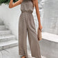 EOS | Ärmelloser Jumpsuit mit aufhängendem Halsband